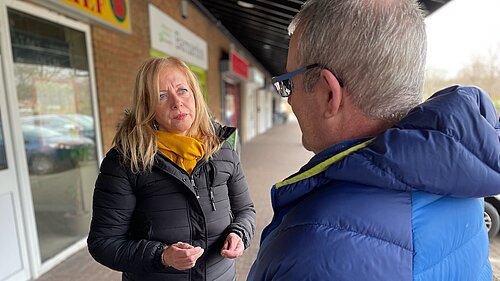 Liz talking to residents